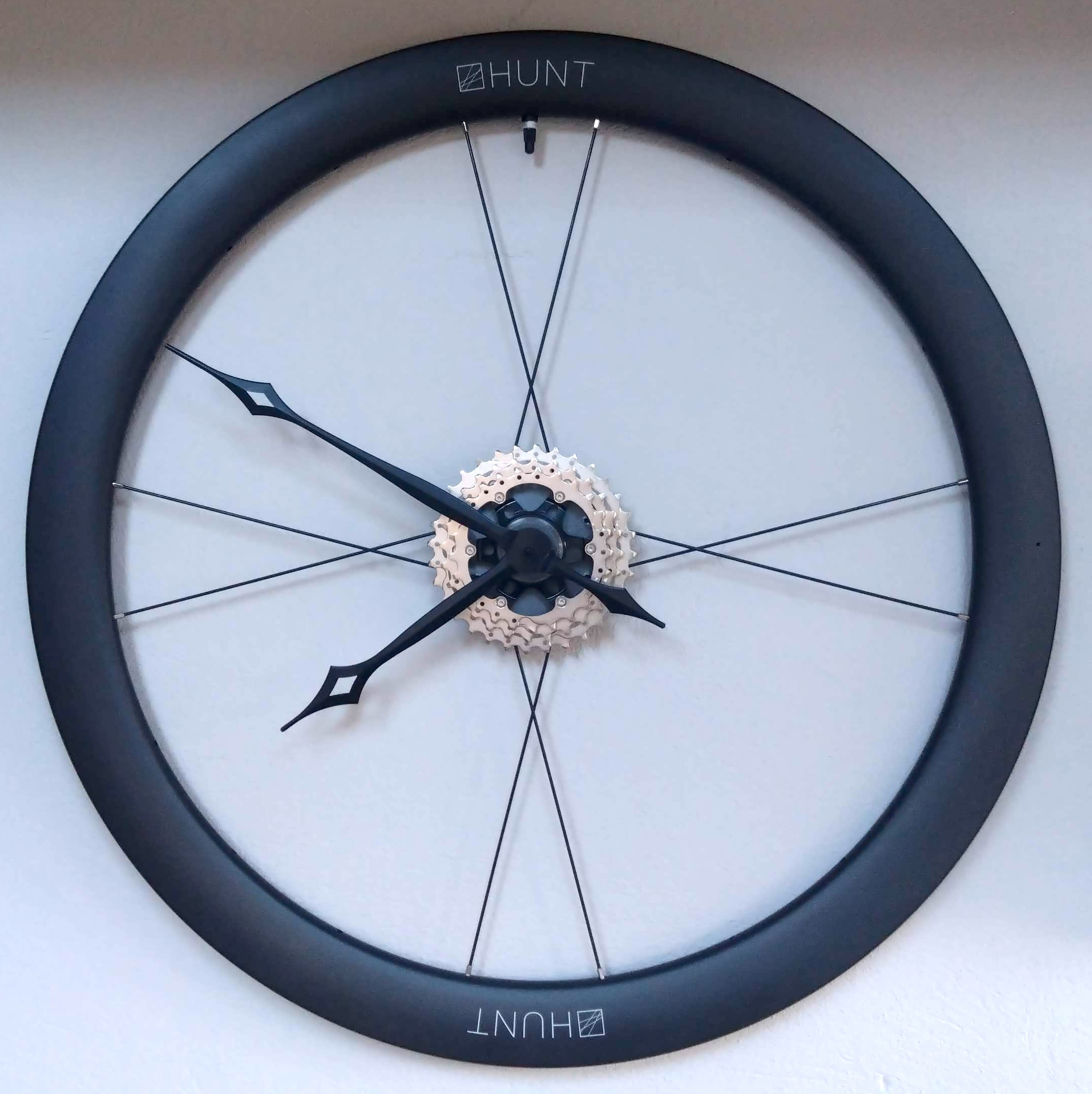Carbon aero bike wheel clock